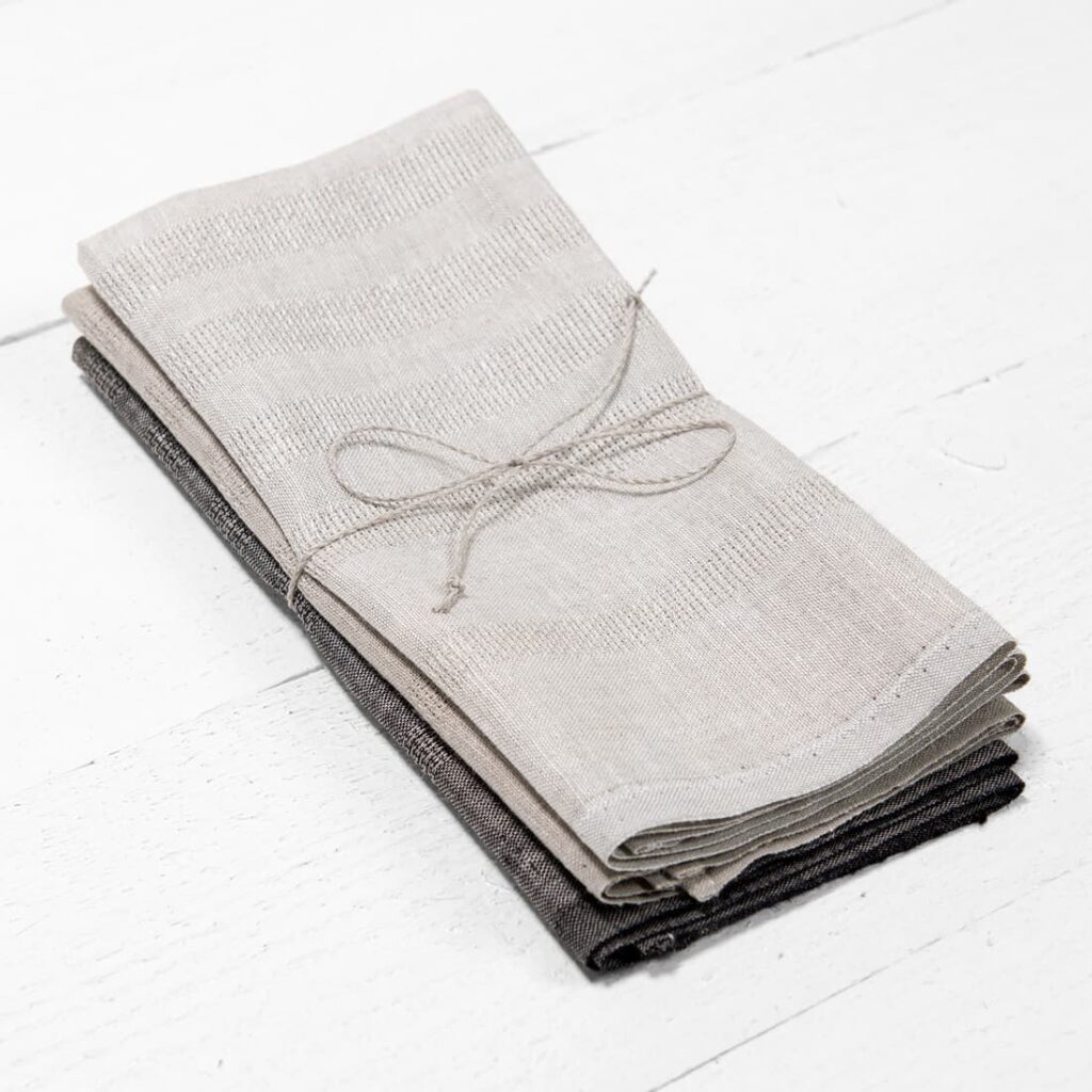 set of kitchen towels in beige, natural and black