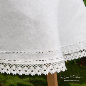 100% linen tablecloth in white, round.