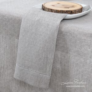 Light grey 100% linen napkin in a slight open-weave pattern