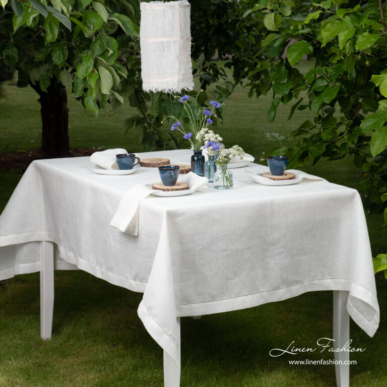 White patterned linen tablecloth with hemstitch