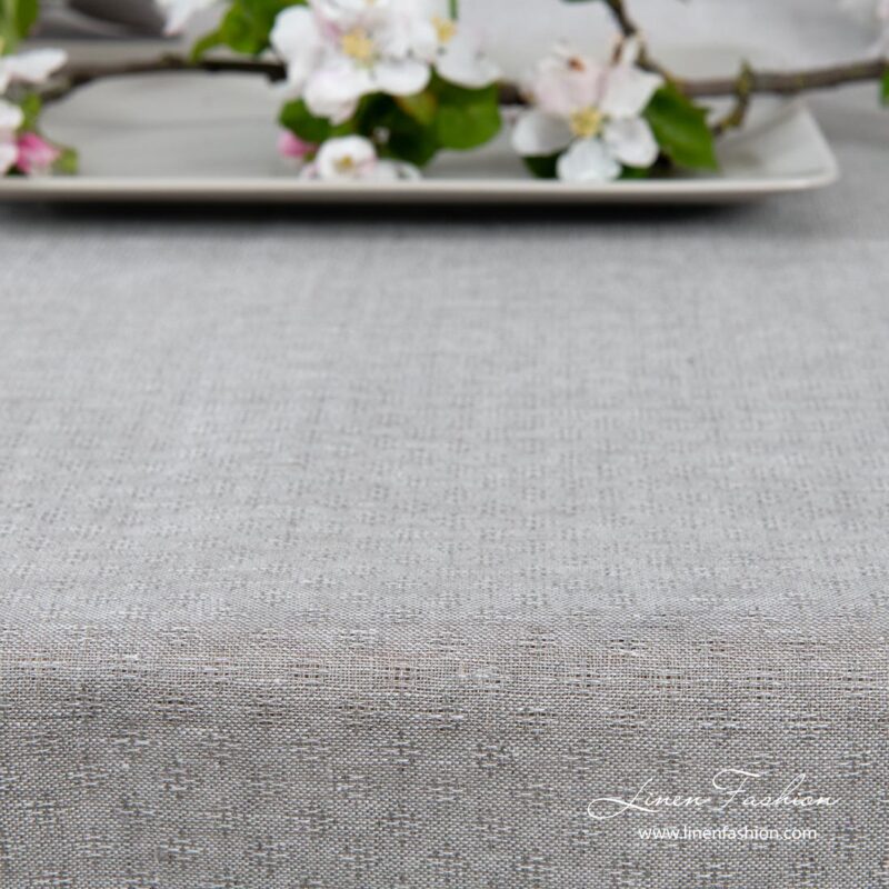 Light grey patterned linen tablecloth with hemstitch