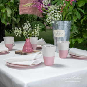 Off-white hemstitched linen tablecloth with matching napkins