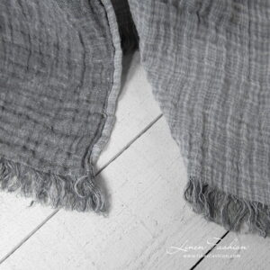 Linen grey doublesided blanket, with fringes.