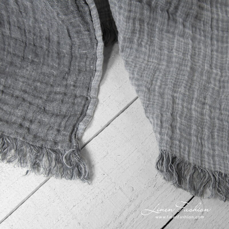 Linen grey doublesided blanket, with fringes.