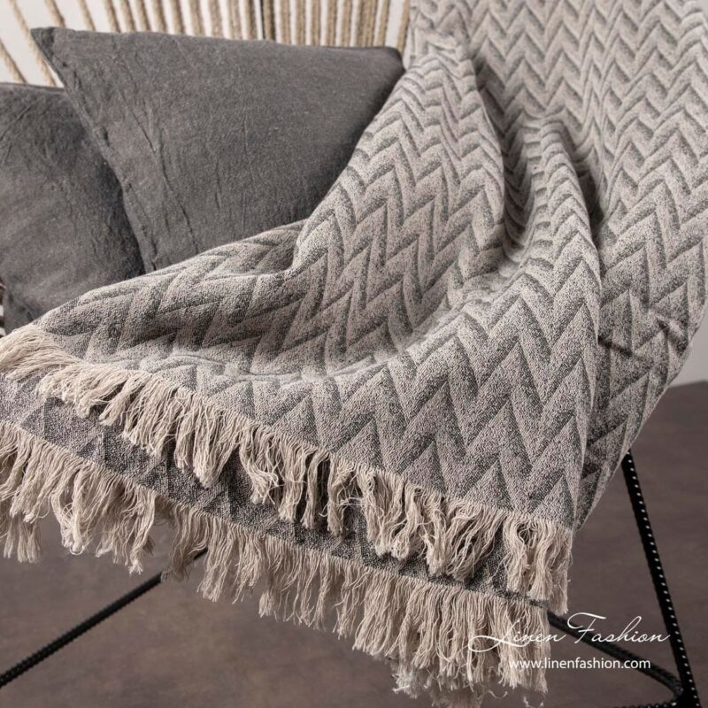 Grey zigzag patterned linen blanket with fringes