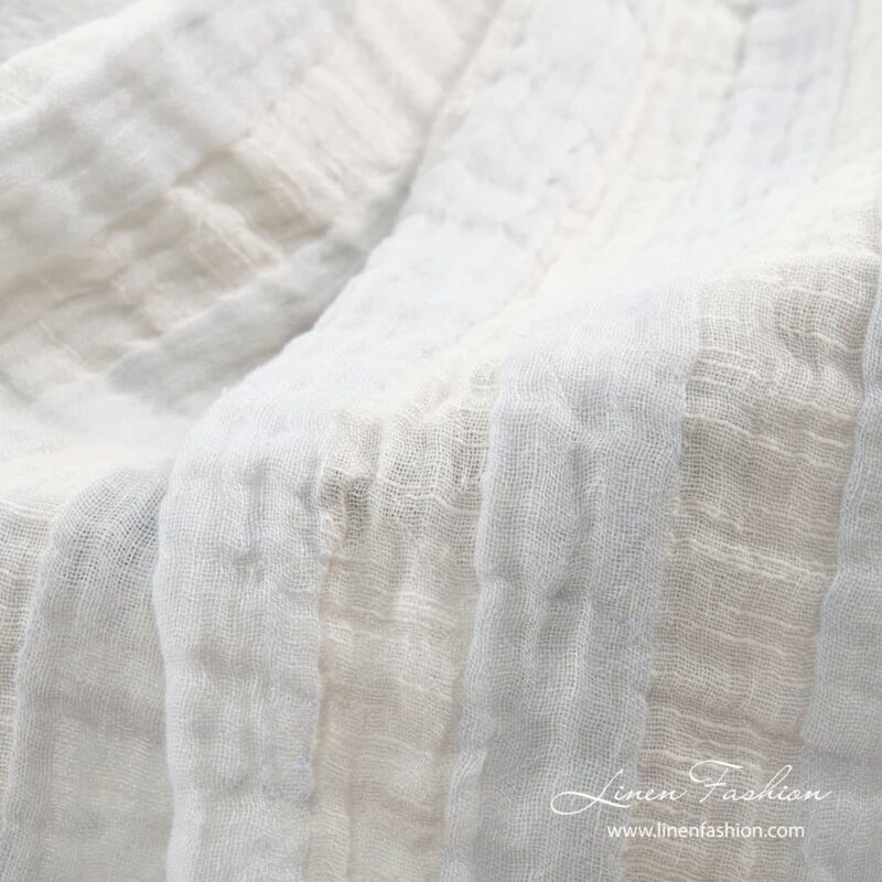 Off-white blanket, madam.