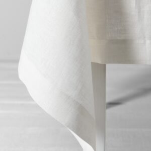 Off-white tablecloth, folded hem