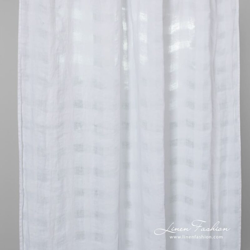 Optical white linen curtain in transparent checks