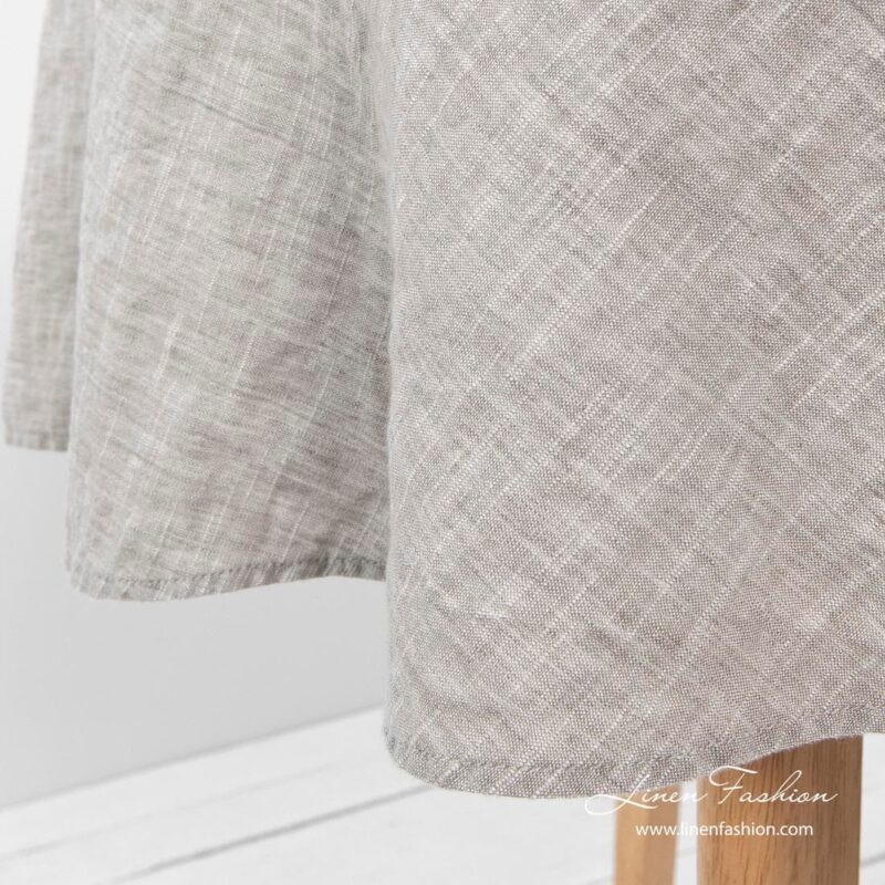 Light grey colored round tablecloth, astra.