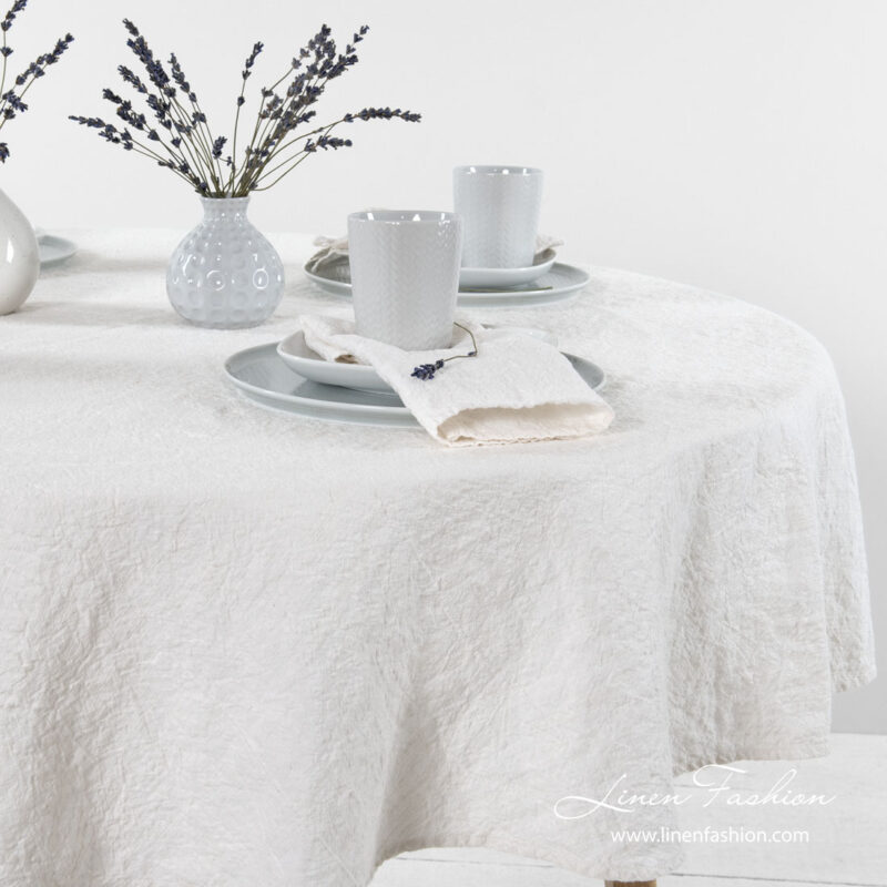 Round off white linen cotton tablecloth, washed
