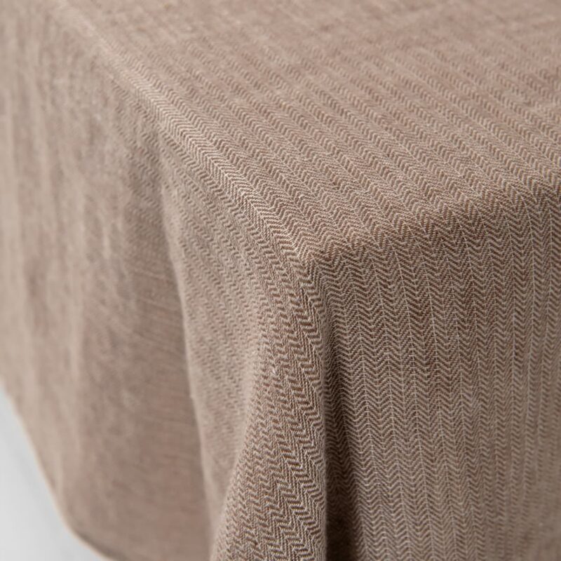 brown linen herringbone tablecloth view from corner.