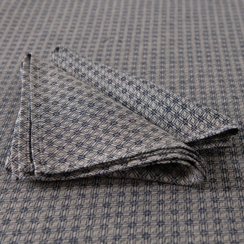 dark blue patterned linen-cotton tablecloth matching napkins