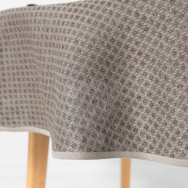dark brown patterned linen-cotton tablecloth, with beige piping