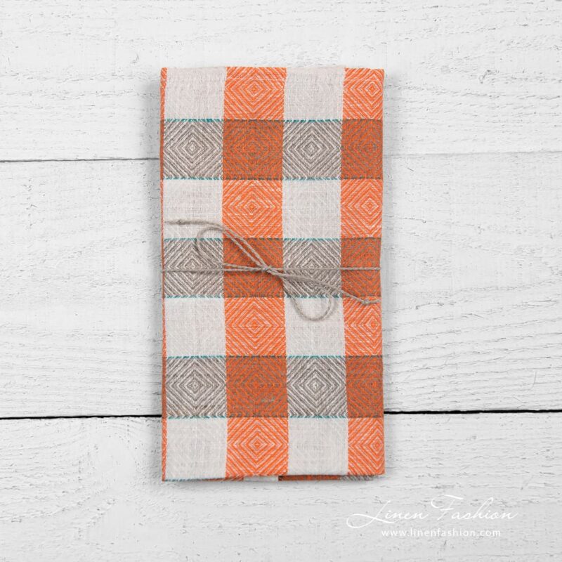 Linen kitchen towel in check and rhombuses pattern