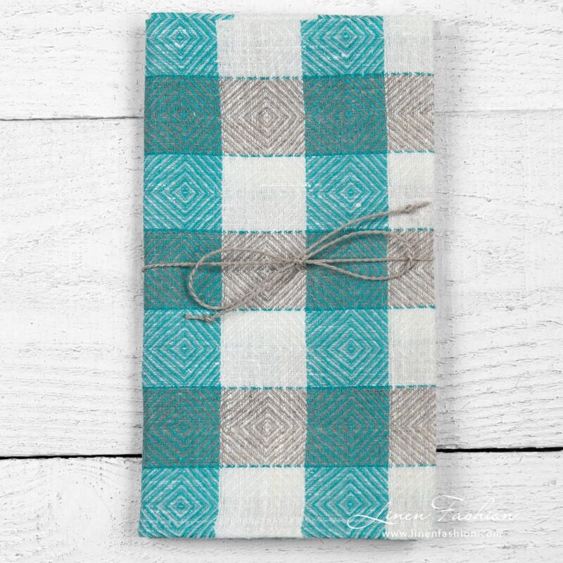 Linen kitchen towel in rhombuses and checks