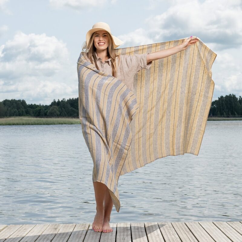 Yellow linen beach towel with blue stripes