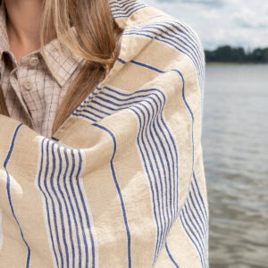 Yellow linen beach towel with blue stripes