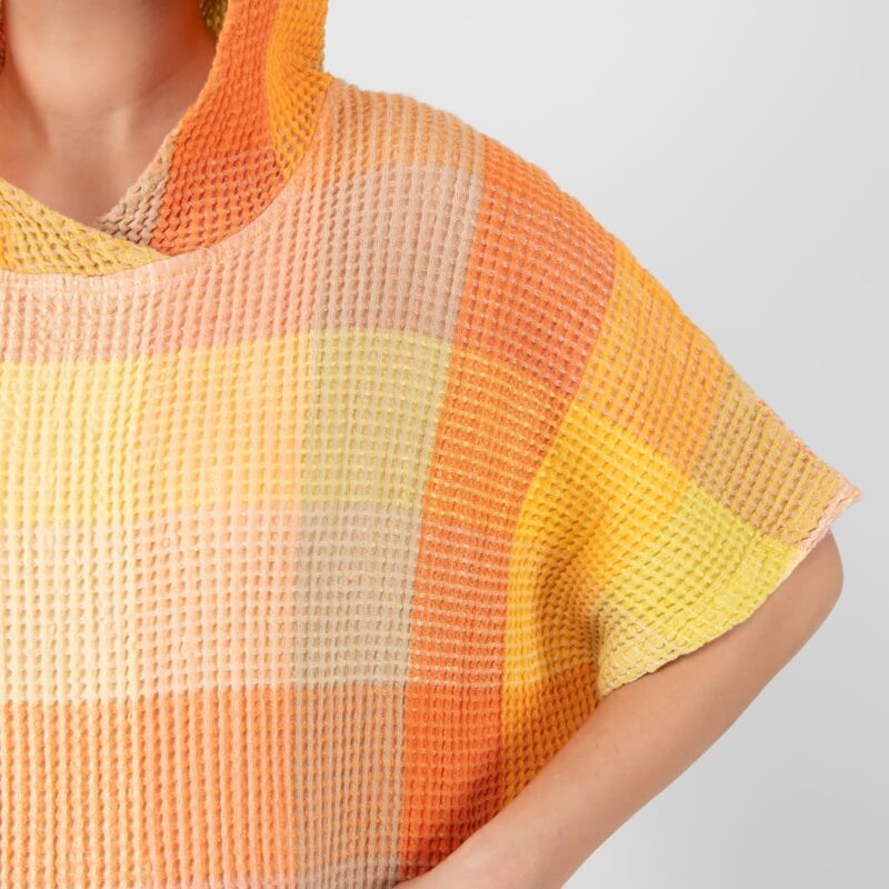 orange linen poncho waffle structure, checks.