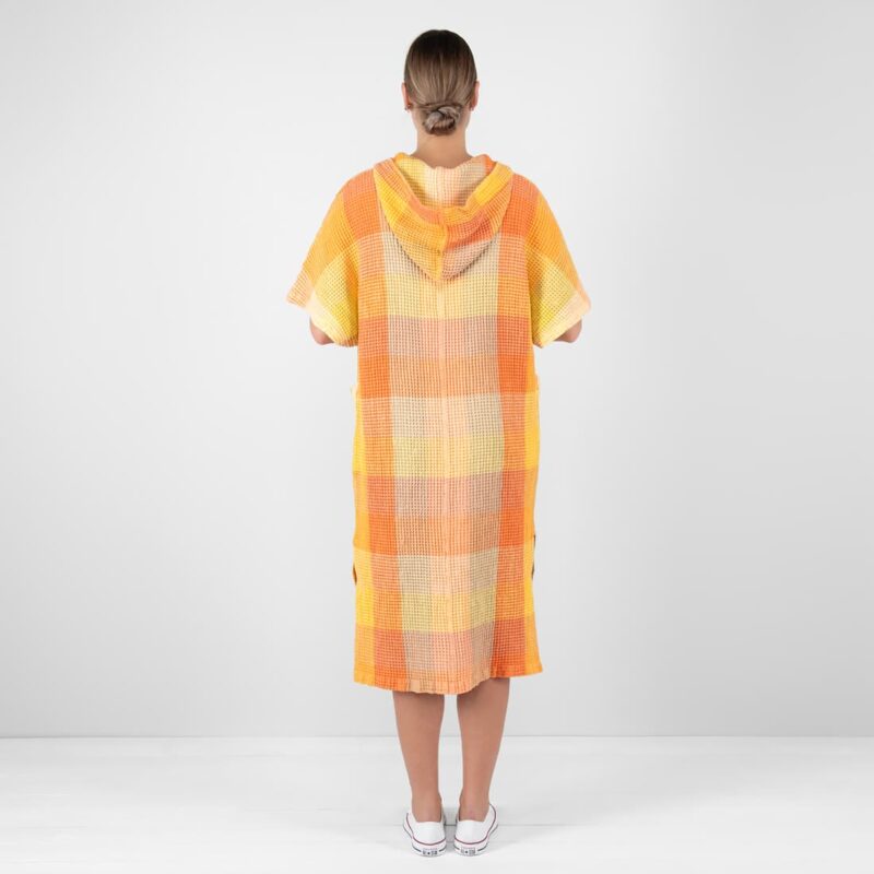 orange linen poncho from backside.