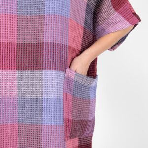 lilac linen poncho with pockets.