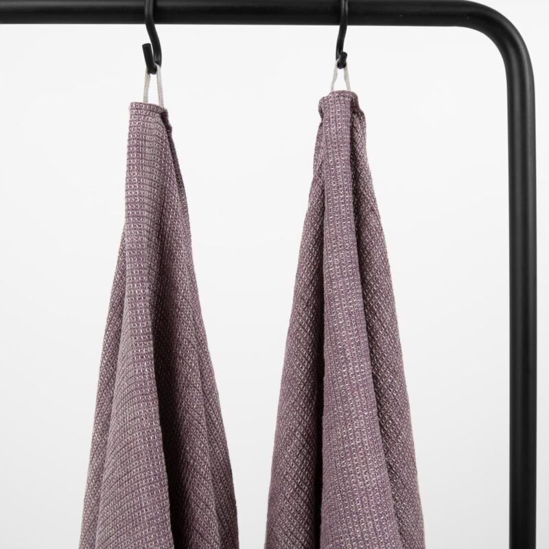 linen violet bath towel with hanger.