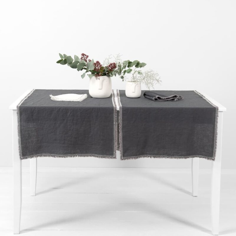 grey linen runner with decorative stitch