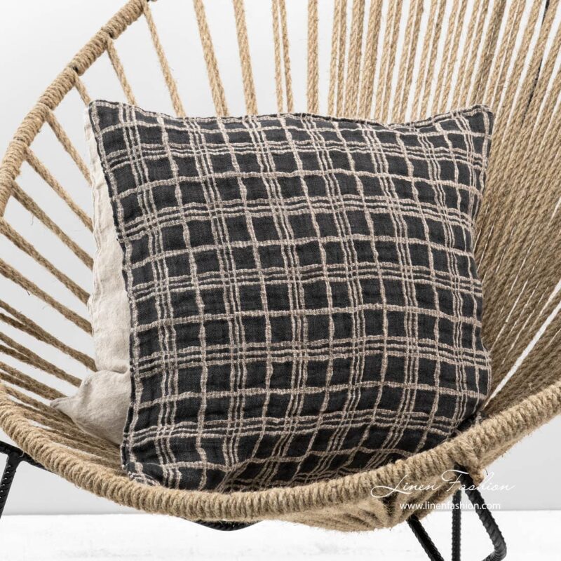 Grey linen cushion cover, focus.