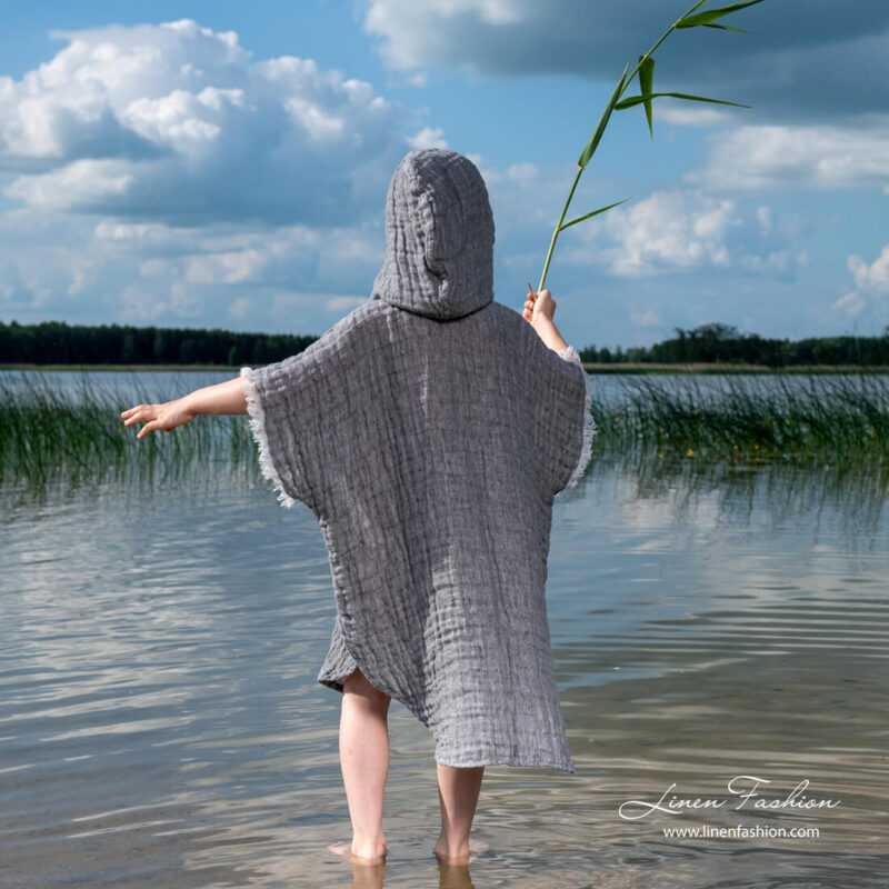 Grey kids poncho with longer back