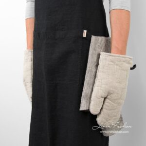 Black colored 100% linen apron.