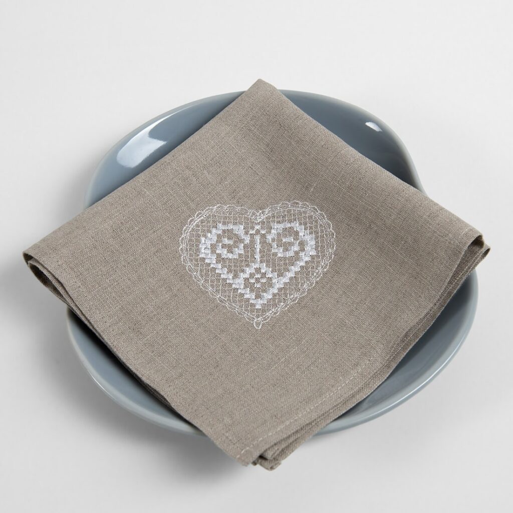 Natural linen napkin with white embroidery