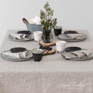 Linen tablecloth in grey color.
