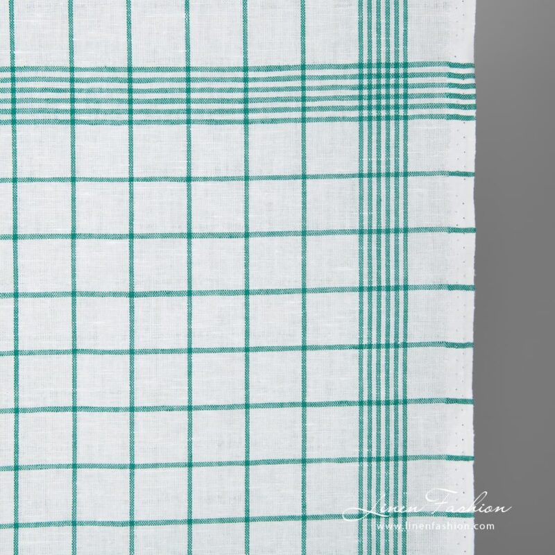 White fabric with green checks narrow width close up view