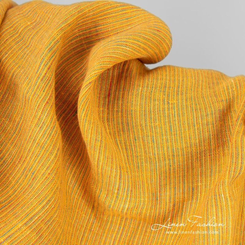 Yellow linen fabric in narrow stripes