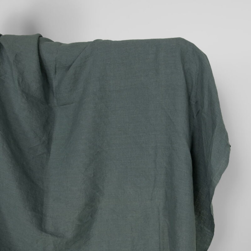 Washed linen fabric in balsam green colour