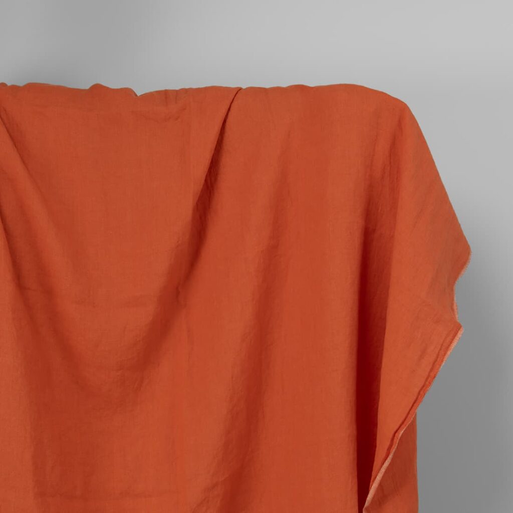 Washed linen fabric in dark orange