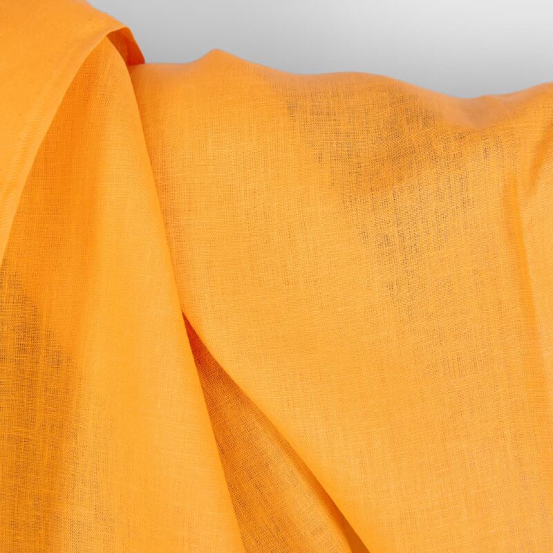 Linen fabric in plain vibrant warm yellow texture