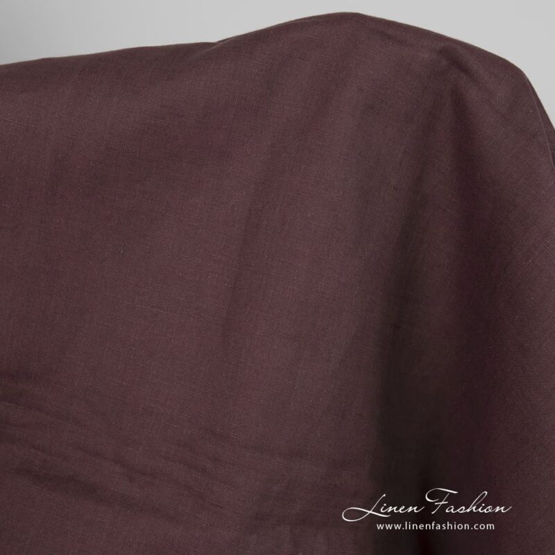 Linen fabric in brown-violet melange close up detail