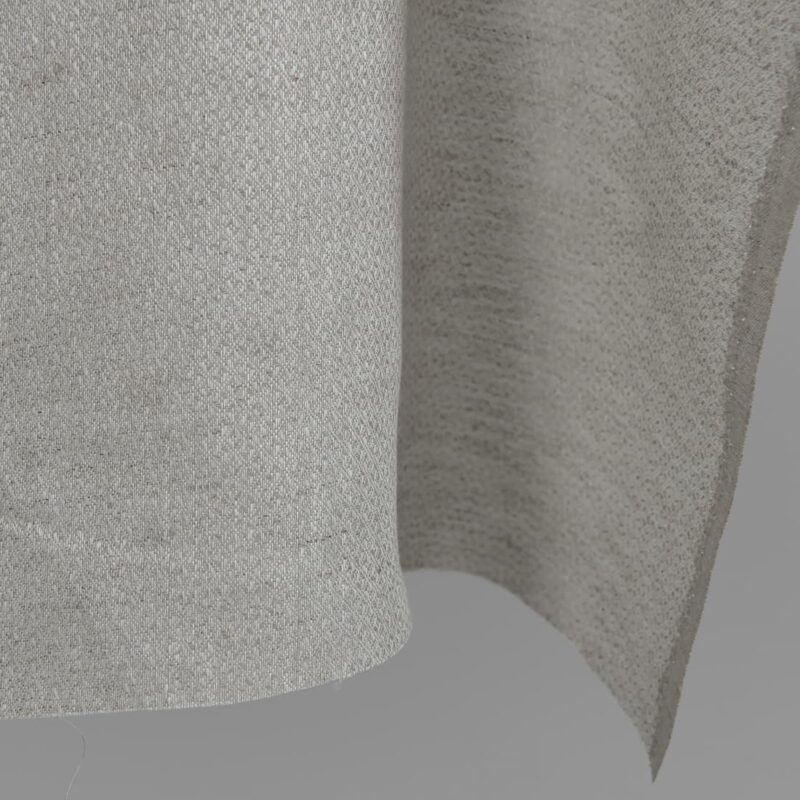 Beige linen fabric in a diamond pattern edge