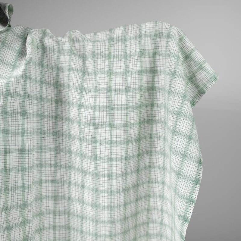 White linen cotton fabric with striped green checks
