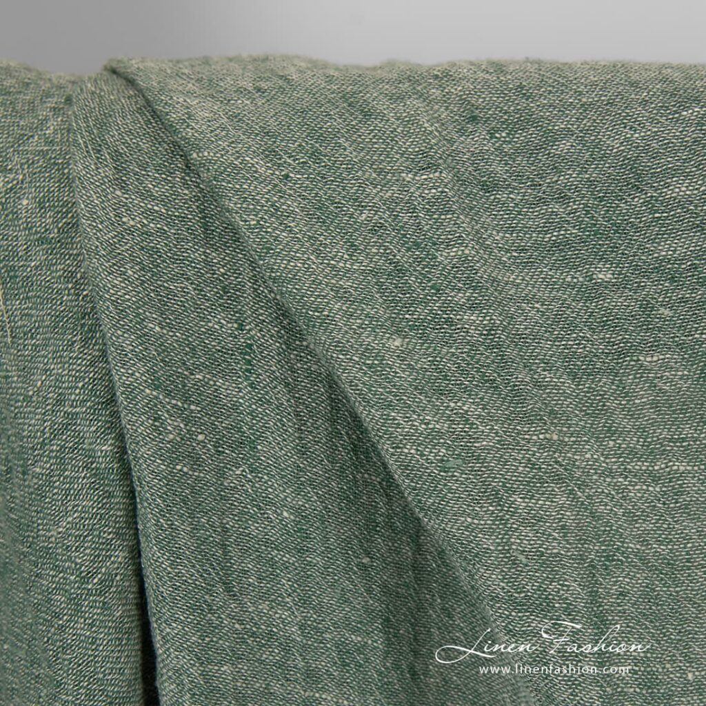 Przeźroczysty zielony prany len 2 Transparent linen fabric in green colour.