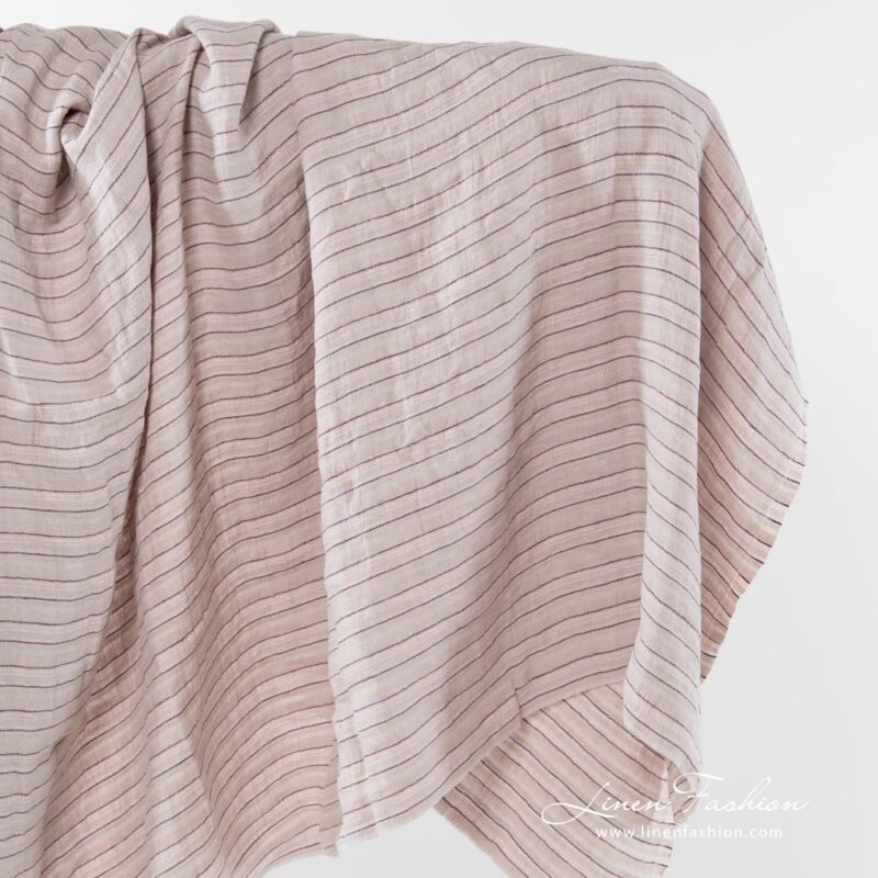 Washed linen fabric in ash and pastel pink.