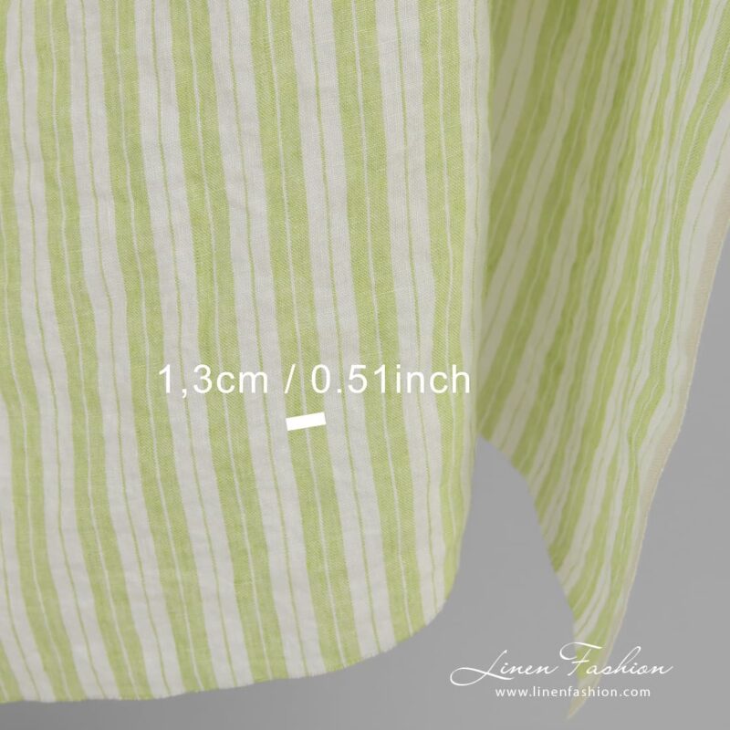 Light green linen fabric in stripes, perfect for clothes and home textile