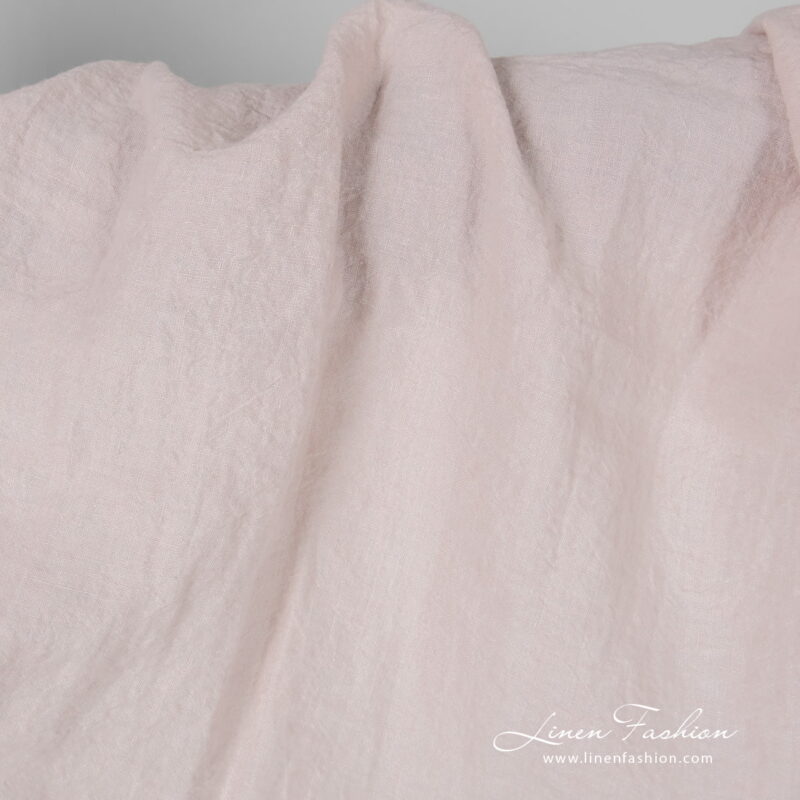 Wide light pink linen fabric, washed
