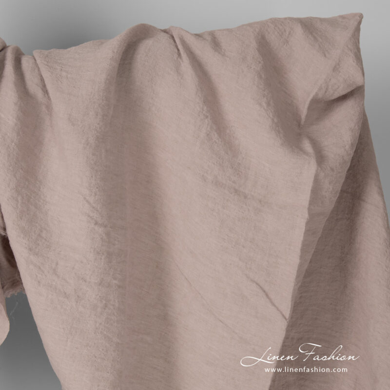 Wide linen fabric in smokey rose colour, washed