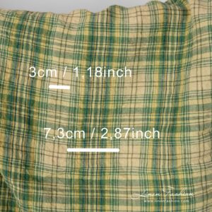 Washed linen fabric in green, yellow checks with check size