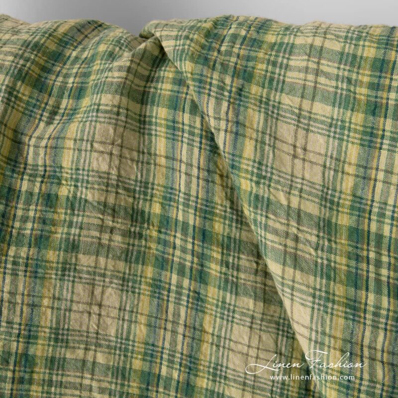 Washed green checked linen fabric