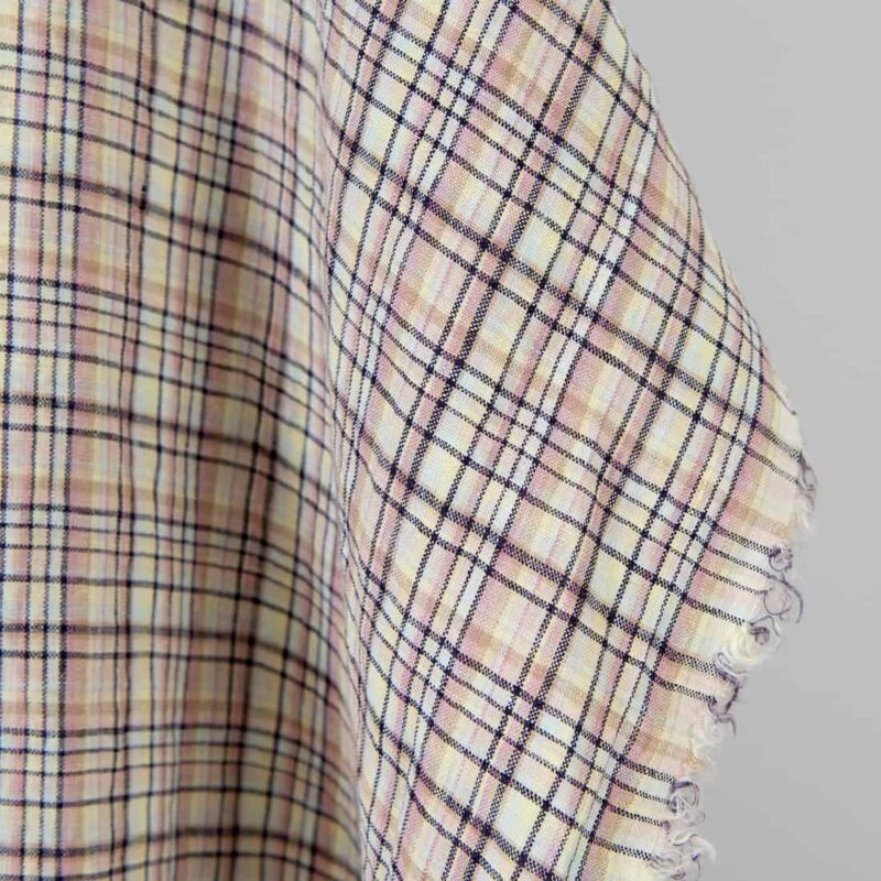 Washed linen fabric pastel multicolour and dark blue checks, fabric edge