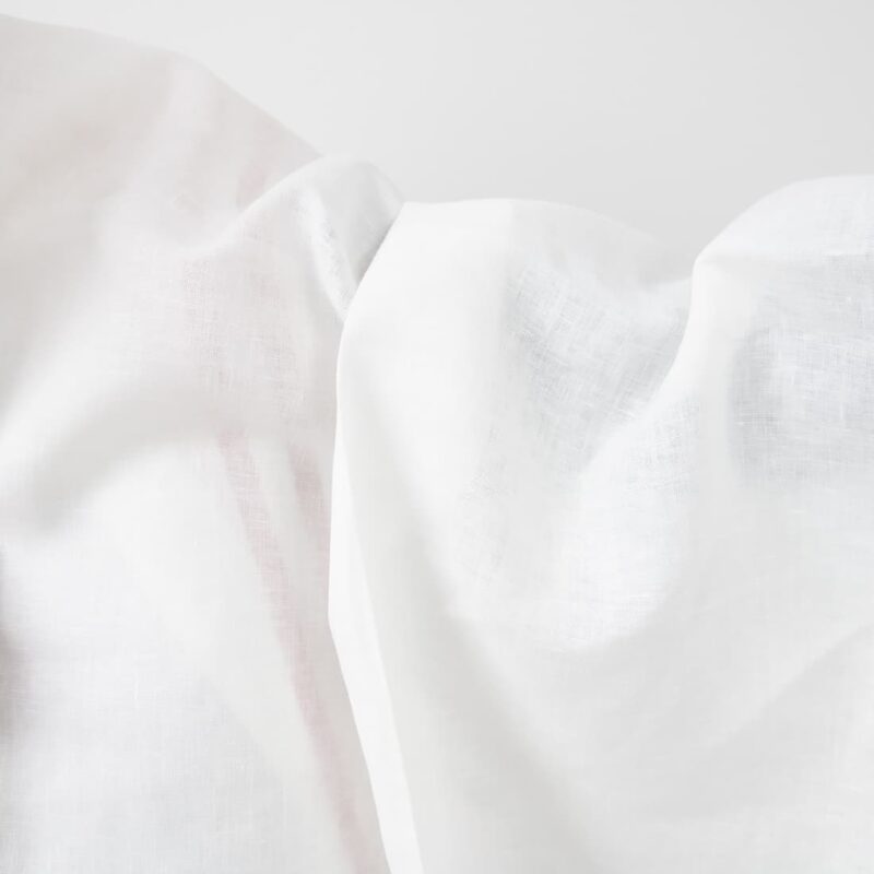 White linen fabric with red lines texture
