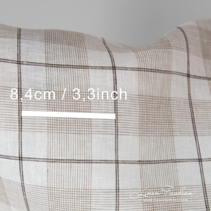 Brownish dyed 100% linen fabric in checks.