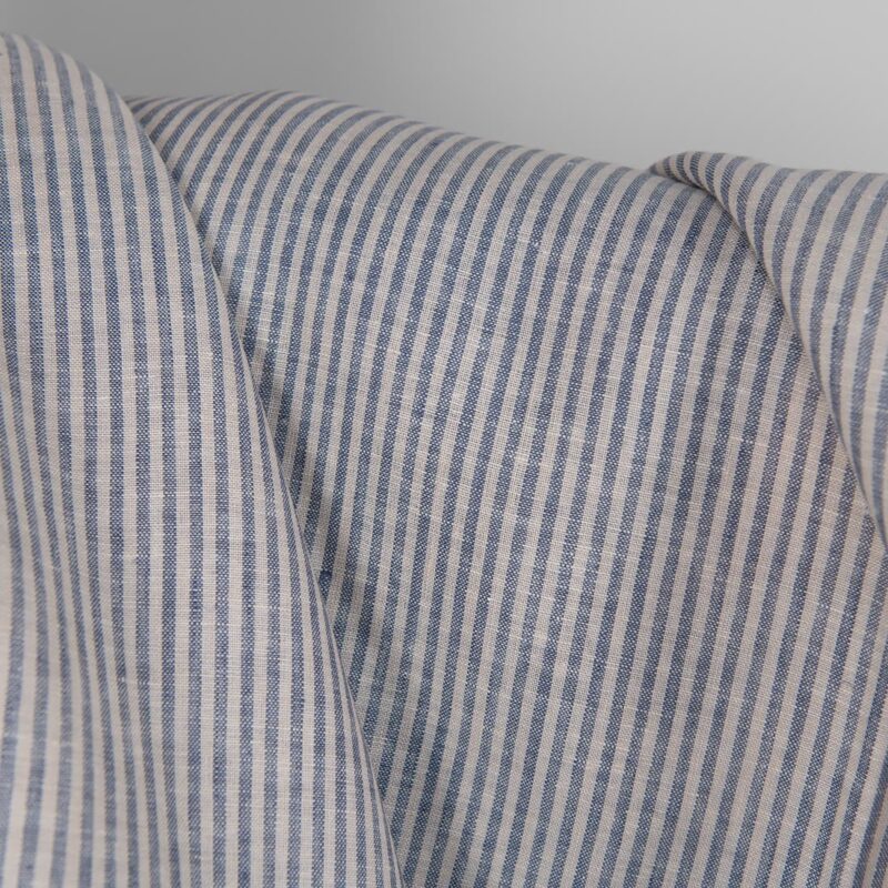 Linen fabric in blue and brownish colour stripes close up detail